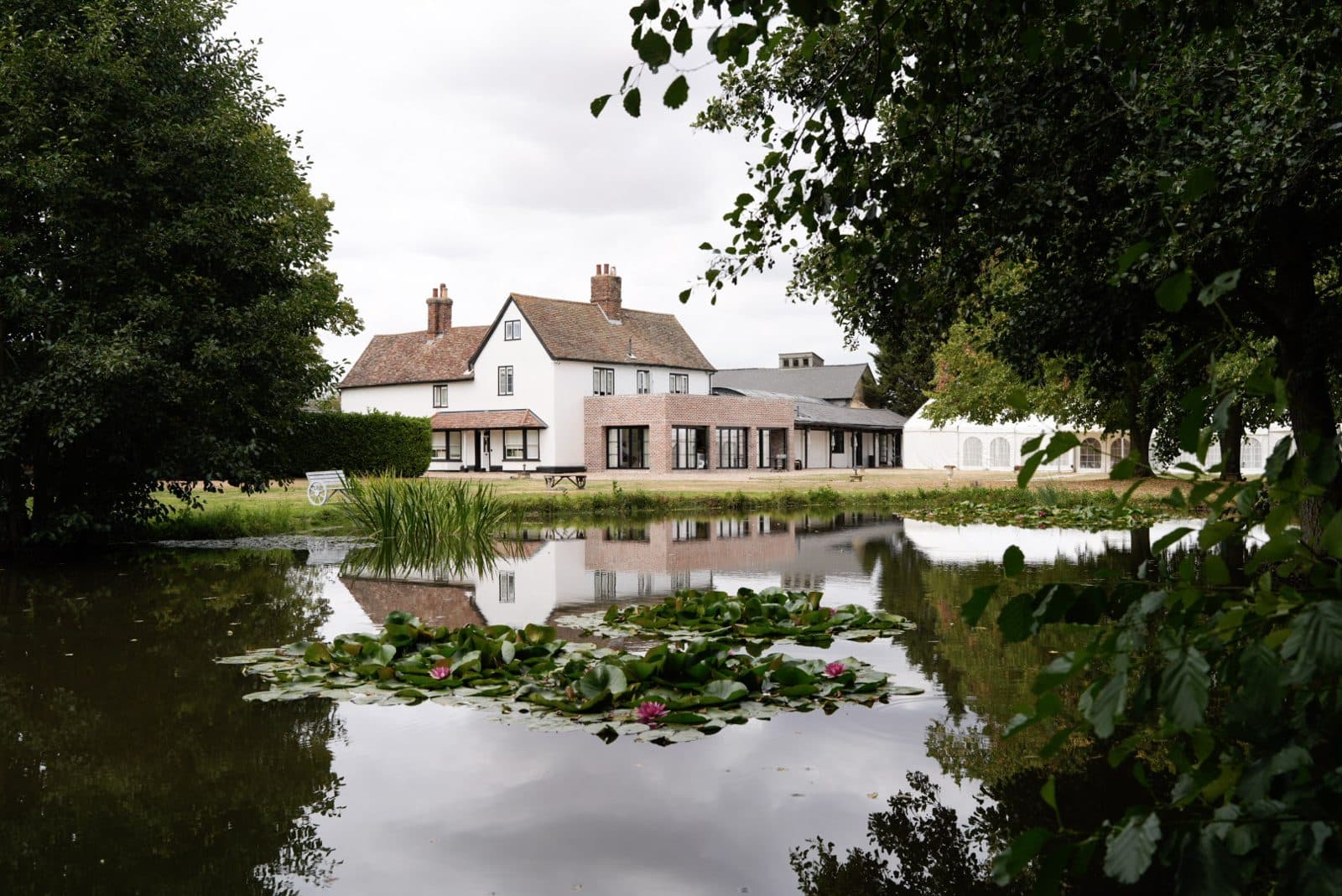 The farmhouse across the lily pond